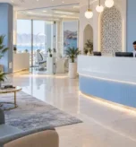Best dental clinic in Muscat modern reception area with professional receptionist